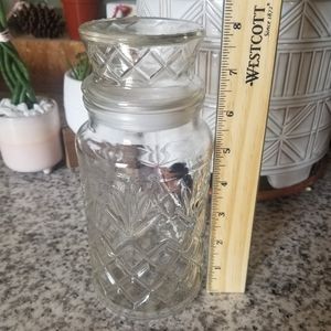 Vintage glass Peanuts Jar.